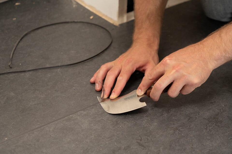 Серповидный нож Leister